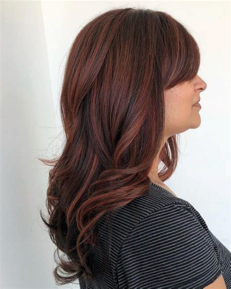 Red to brown hair. The Best Red Hair Color Ideas to Try Right Now. From strawberry copper to bold burgundy. By Danielle Sinay. March 8, 2024. Instagram/ @carmen.solomons, @nikki_makeup. Red hair color has never been ... 