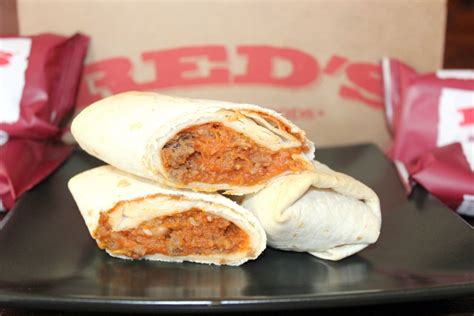 Reds burritos. Instructions. Wrap tortillas in damp paper towels and microwave for 20 seconds on 50% power. Top each tortilla with refried beans, Taco Bell red sauce, onions and cheese. Fold in the top and bottom and wrap tightly before serving. 