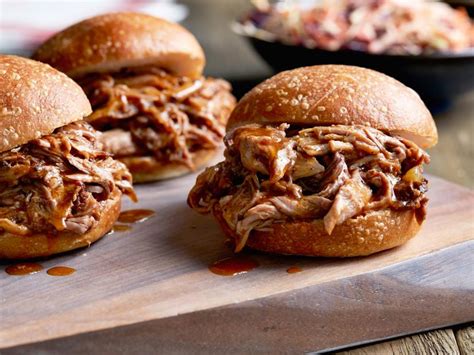 Watch how to make this recipe. Preheat the oven to 450 degrees F. For the barbecue pork: In a medium saucepan, heat the oil until shimmering. Add the onion and cook until tender, about 5 minutes .... 