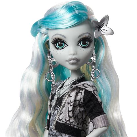 Monster High Doll, Lagoona Blue with Accessories and Pet Piranha, Posable Fashion Doll with Colorful Streaked Hair ... Monster High Doll, Lagoona Blue in Black and White, Reel Drama Collector Doll, Doll-Size and Life-Size Posters, Horror Flick Theme, Toys and Gifts. 4.6 4.6 out of 5 stars (186) Ages: 6 years and up.. 