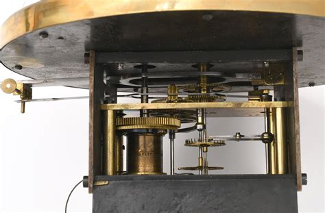 Regulator clock movement.  Sold AS IS A small modern mantel clock from the 1960...