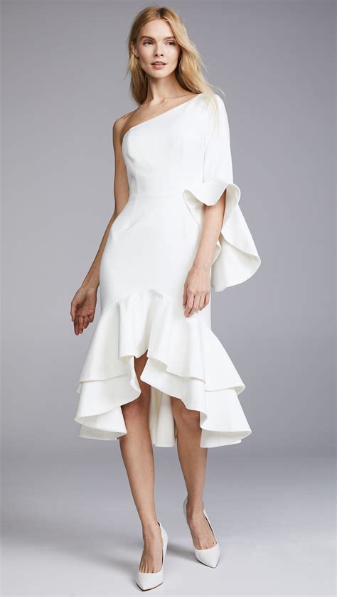 Rehearsal dinner dress code. Image by Paola Rech via Lauren Arthurs. 11. For her rehearsal dinner outfit, Lauren Arthurs of Love Lauren wowed in an off-the-shoulder white dress from ASOS which she paired with Bottega … 