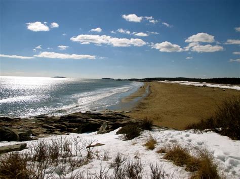 The state park encompasses over 780, mostly forested acres. Its shoreline includes the much smaller East Beach, popular with kayakers. Ocean water rushes beneath a timber bridge here into a large saltwater lagoon. The park is named for Walter E. Reid, a Georgetown native who gave this land to the state in the late 1940s.. 