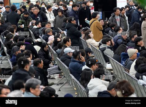 Relatives of passengers gather