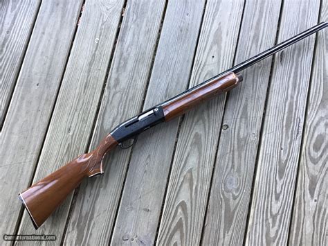 This is a very clean 1100 16 ga. Unlike the newer "Classic Field" version, the older 1100 16's are sought after because they have a true 16 ga barrel instead of a heavy, underbored 12 ga. This 1100 has a 28" modified vent rib barrel, the earlier style butt stock and the early receiver.. 