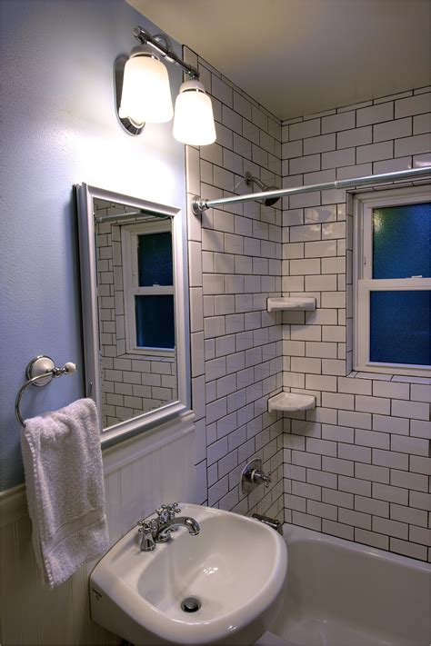 Remodel a small bathroom. Go Big With a Mirror. Pure Salt Interiors. Lighting is definitely key to making your space as bright and open as possible, but Rose suggests focusing on your mirror as well. If you're struggling with a smaller bathroom, consider avoiding smaller above-the-sink mirrors and going for a larger one. 