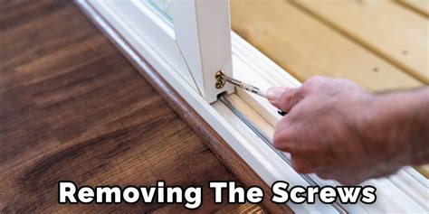 Remove the cover from the armrest by gently tugging. Take the screws out, and pop off the two plugs using the removal tool. Remove the cover underneath the door handle. Take out the screws found under that cover. Now, using the removal tool, pop the panel out of place all the way around the frame.. 