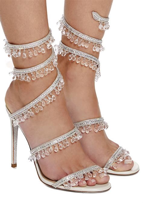 Rene caovilla. White Jewel Chandelier Pumps 75. £1.670. NEW IN. Cleo Honey Sandal With Crystals 105. £1.240. Cleo Champagne Sandal With Crystals 105. £1.180. Experience the italian luxury style of René Caovilla®'s footwear. Handcrafted jewel shoes and elegant accessories. 