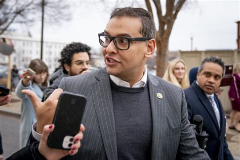 Rep. George Santos charged in web of fraud, including stealing from campaign to buy designer clothes