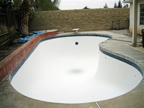 Repainting a fiberglass pool.  Like all other surfaces, fibreglass will ...