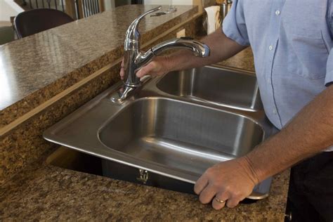 Replace kitchen sink. Save money and time with our popular All-in-One kitchen sink sets. These include the sink, faucet, hoses and mounting hardware – everything you need to get the job done right and to get a cohesive look. Replacing a kitchen sink is less stressful when it's completed by professionals. 