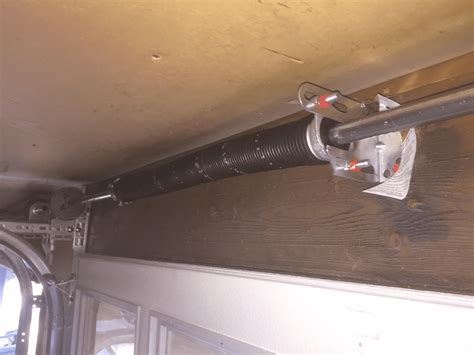 Replace spring garage door cost. The cost of replacing your garage door springs varies depending on a few different factors. The first is damage. If the spring has completely fallen to pieces and you need entirely new hardware, the price for the piece and labor could be as high as a couple of hundred dollars to just a few dollars. For older models or heavier residential garage ... 