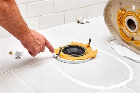 Replace wax ring toilet. Replacing wax ring. Turn off the water supply. Flush toilet to empty tank and sponge out excess water. Unscrew ballcock coupling nut and disengage water supply tube. Carefully pry off bolt caps and unscrew nuts securing bowl to the floor. Carefully lift toilet straight up until bolts in the floor have cleared bowl and place toilet aside. 
