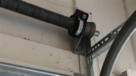 Replacing garage door cables. 
