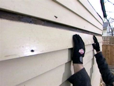 Replacing siding on house. Find out why replacing the exterior siding on your home is a smart investment and a project best left to a professional.Find more great content from DIY Netw... 