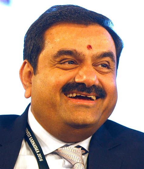 Report says close associates of India’s Adani Group secretly purchased large numbers of shares