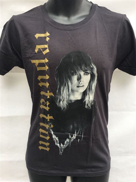 Reputation shirt taylor swift. Taylor Swift Wants You to Wear Snake Items Because Revenge Is Best Served in Style. ... White Long Sleeve Tour Tee With Reputation In Gold. White Long Sleeve Tour Tee With Reputation In Gold ($45) 