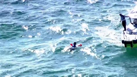 Rescue crews pull diver out of water in Sunny Isles Beach