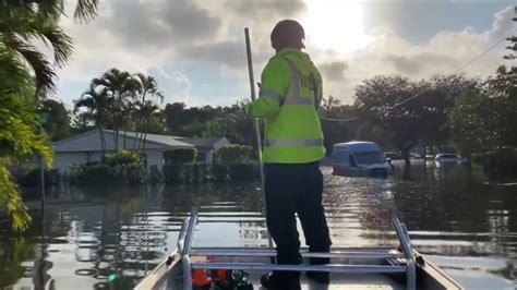 Rescue crews work to save residents affected by severe floods in Fort Lauderdale