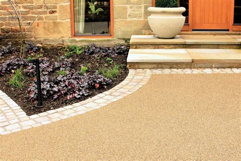 Resin driveway. To fix a cracked resin driveway surface, follow these steps: Clean the driveway: Start by thoroughly cleaning the cracked area of the resin driveway. Remove loose stones, debris, dirt, or vegetation using a broom, brush, or pressure washer. Ensure the surface is free from any contaminants that could interfere with the repair process. 