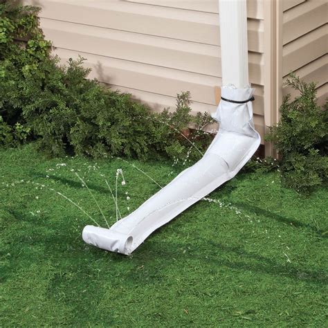 The vinyl extension attaches to the downspout. It’s rolled up until it fills with rainwater from the gutter. It then rolls outward 46 inches, releasing the water gently several feet away from the foundation. Once the rain has stopped, the vinyl rolls back up and will be out of the way again. The extension consists of a weather-resistant vinyl.. 