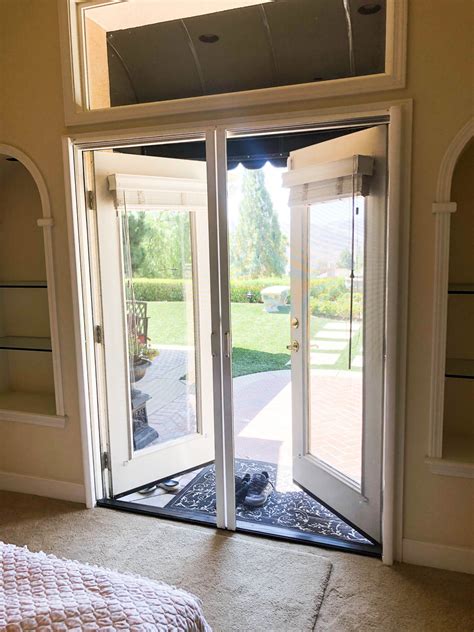 Retractable screens for french doors. These innovative french screen door are designed to provide air circulation while retaining privacy. The mesh fabric rolls up when not in use, allowing for versatile installation options. French door retractable screens protect your home and family from mosquitoes, flies and other insects. They also help support a healthy indoor air quality and ... 