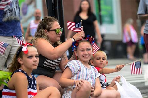 Revelers across the US brave heat and heavy downpours to celebrate Fourth of July