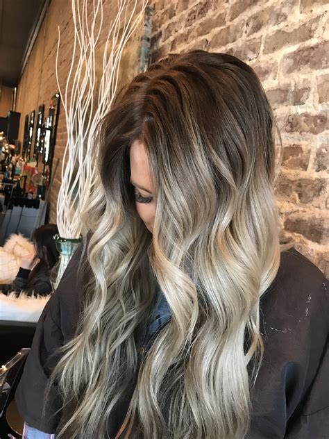 Reverse ombre blonde roots black hair. Reverse Ombre. In a typical Ombre color, darker hair at the roots and midshaft gives way to a lighter color from the midshaft down to the tips. With reverse Ombre color, the color order is reversed. Now, the lighter color is at the roots and midshaft and gradually blends into a darker color from the midshaft to the tips. 