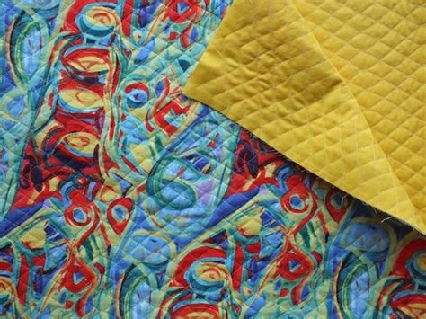 Single Face Quilted Fabric - 42" Wide - Priced by the yard 65/35% Poly-fil - Machine wash warm, tumble dry, remove promptly. Suitable for bed coverings, bags, totes, etc. ... Double-Faced Reversible Pre-Quilted Camouflage color, Fabric. 54" wide, l 100% / polyester Fabric by The Yard.