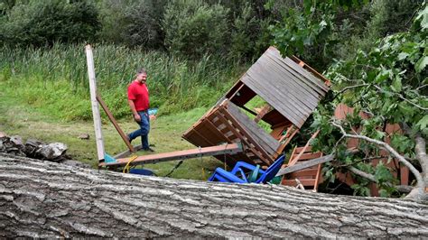 Rhode Island tornado lifts car as New England storms flood roads, topple trees