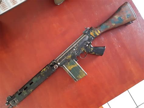 Rhodesia fn fal. Nov 19, 2019 · This is to stop the follower at the correct position. It appears that most of the tube is reamed out forward of this receiver end section, a tricky bit of metal work. It might be easier to use a larger ID tube and sleeve the receiver end. The wood fore end is again the same as that of the A5, excepting the length. 