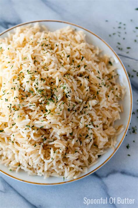 Rice mediterranean. directions. Heat oil & saute onion & garlic until tender, stir in rice. Add boiling water until pan is 3/4 full. Bring to boil, stirring. Stir in stock & rapid boil for 10-12 mins or until tender, drain well. Return to pan adding lemon rind, parsley & pepper, toss well to combine. 
