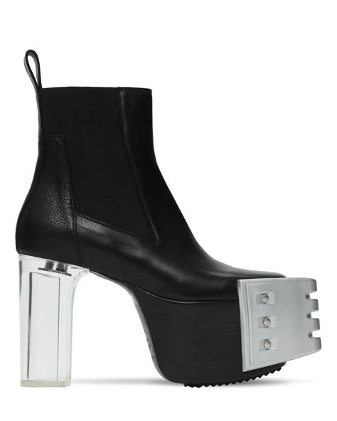 Rick owens kiss boots. FW23 LUXOR. SHOES. RICK OWENS. $ 1.355 - 40% = $ 813. Taxes And Fees Included. RICK OWENS FW23 LUXOR BEATLE BOZO TRACTOR IN BLACK CORTINA GREASE CALF LEATHER. THESE BEATLE BOZO TRACTOR BOOTS ARE ABOVE-ANKLE HEIGHT. THEY HAVE GEOMETRIC SIDE PANELS IN STRETCH ELASTIC, AN … 