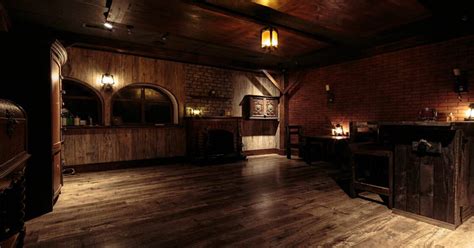 The entire adventure takes place within the bar area of the establishment. At first glance, the environment appears to be eerily calm and quiet. The room is fairly dark, and the only lighting comes from sets of candles located throughout the tavern. Along the far wall sits a long bar with two stools and a small wooden table.. 
