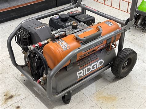 Ridgid zero gravity air compressor. This mid-size, 2.5-gallon compact compressor has two side-stacked air tanks and a 1.5-hp induction pump motor that goes from zero to 135 psi in just 82 seconds. 