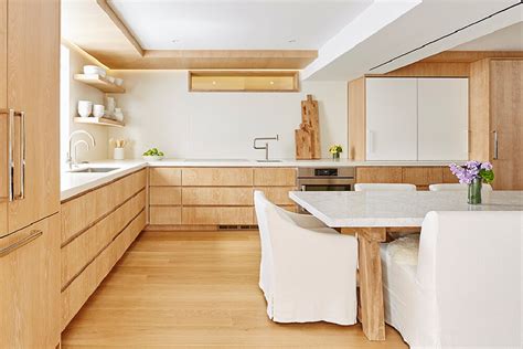 Rift sawn white oak cabinets. Rift sawn white oak cabinets in the kitchen. Tagged: Kitchen, Wood Cabinet, Concrete Floor, Dishwasher, Pendant Lighting, Undermount Sink, Range Hood, ... 