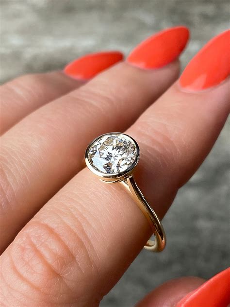 Rings with bezel settings. When it comes to buying an engagement ring or any other piece of fine jewelry, customization is key. One of the main advantages of buying a ring setting only is the endless possibi... 