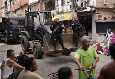 Rio de Janeiro’s security forces launch raids in 3 favelas to target criminals