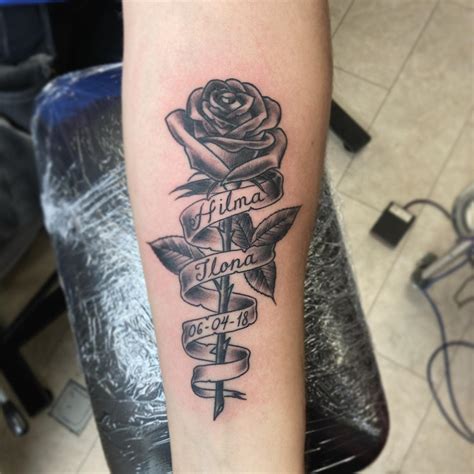 3. Rose and Clock Tattoo. Roses tattoos embody lov
