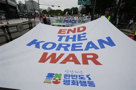 Rival Koreas mark armistice anniversary in two different ways that highlight rising tensions