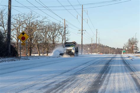Road conditions: Wet, spring-like snow coats roadways