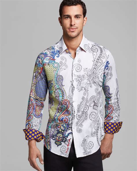 Robertgraham. A classic fit offers a roomier feel while our tailored fit creates a modern silhouette. Sleeve cuff details and cool prints add a bold splash of color. Because luxury should never be boring. Shop our eclectic collection of button down shirts and sport shirts from designer Robert Graham. Perfect for any occasion. 