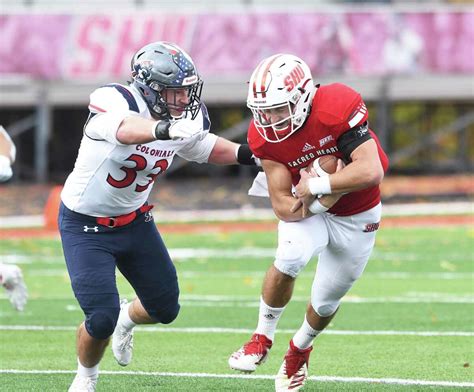 Robinson, Perrantes help NEC-leading Duquesne to 27-0 win over Sacred Heart