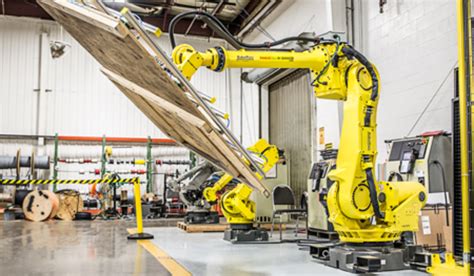 Robot application in material handling.  Automation and robotics for wood ...