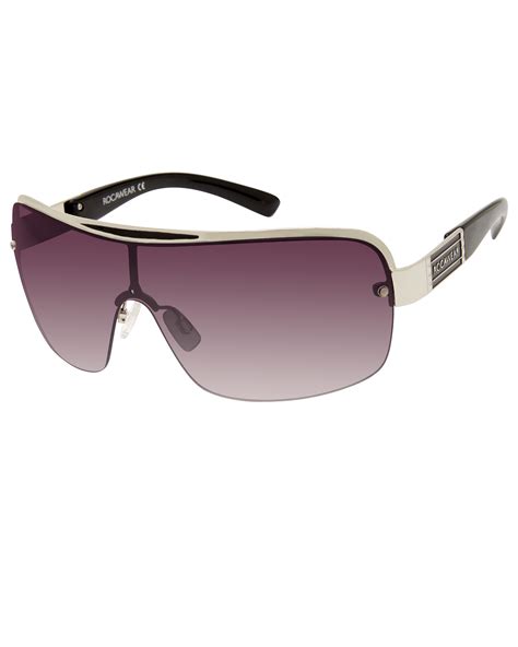 Shop ROCAWEAR Sunglasses for Men & Women . Launched off the meteoric success of co-founder, Shawn "Jay-Z" Carter, ROCAWEAR represents a border-less global lifestyle. Shop Bold, Edgy looks fused with Classic Design and a Street-Wear feel to personify ROCAWEAR, the Premium Urban Brand.