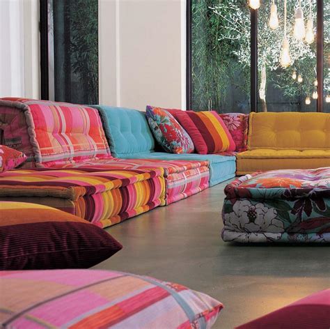 Rochebobois. Portuguese visual artist Joana Vasconcelos designed the Bombom collection for Roche Bobois. It comprises a range of seats and decorative accessories with bold, delectable shapes suited to both indoor and outdoor use. Bombom collection, designed by Joana Vasconcelos. https://fcld.ly/x79wpid 