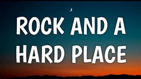 Rock and hard place lyrics. Jul 15, 2022 · [Chorus] Between a rock and a hard place Red wine and mistakes Tears rollin' down your face When I walked out that door That's when I lost it Midnight in Austin Damn, I'm exhausted What the hell's ... 