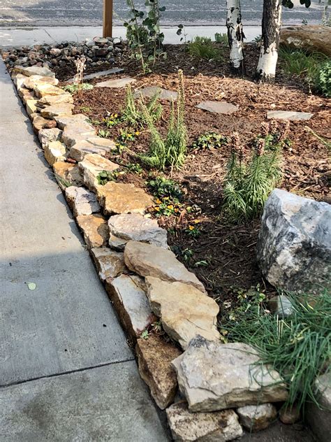 Rock landscape edging. Home >> Edging >> Bender Board Edging. Bender Board edging offers the flexibility to create organic shapes with timesaving and simple installation. Great durability while retaining a natural appearance. Available in 4″ x 20′ or 6″ x 20′. BendaBoard Edging. 