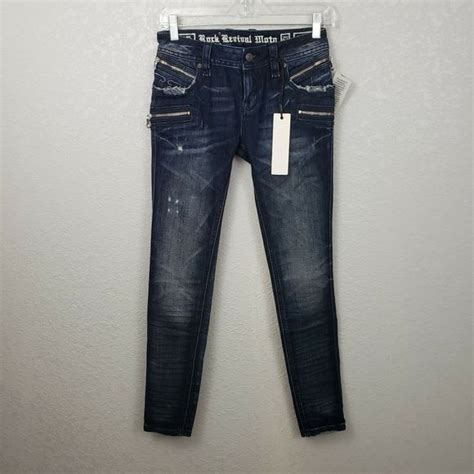 Shop maleriebernal's closet or find the perfect look from millions of stylists. Fast shipping and buyer protection. Rock Revival Moto Camille Skinny Stretch Jean Color: Dark Wash Size: 29 Inseam: approx. 29” EUC. Great condition Moto jeans. Minimal wear. Light stretching on front side. Zippers at Ankles. Intentional distressing throughout. Bottom hem in great condition. • Low Rise • 6 1/ .... 