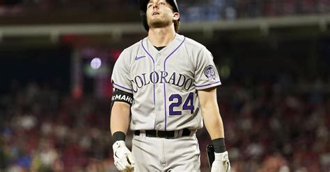 Rockies lose seventh straight as late rally vs. Reds comes up short